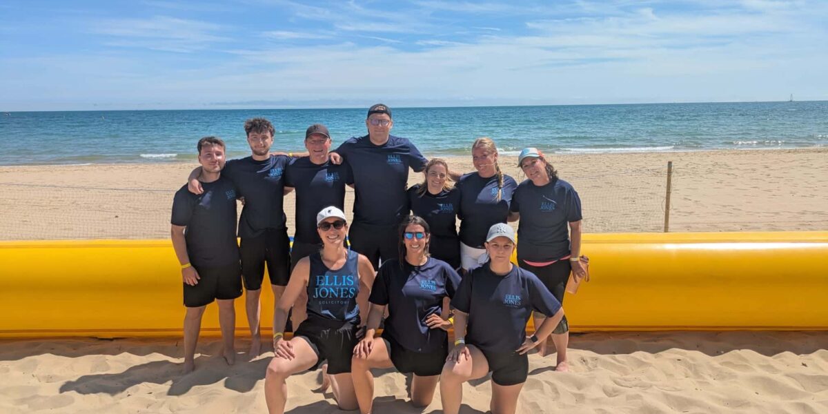 Team fundraising at Sibbett Gregory touch rugby event